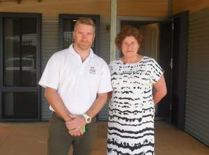 Hon Brendan Grylls MLC and Kathleen Gregory in front of one of the South Hedland properties